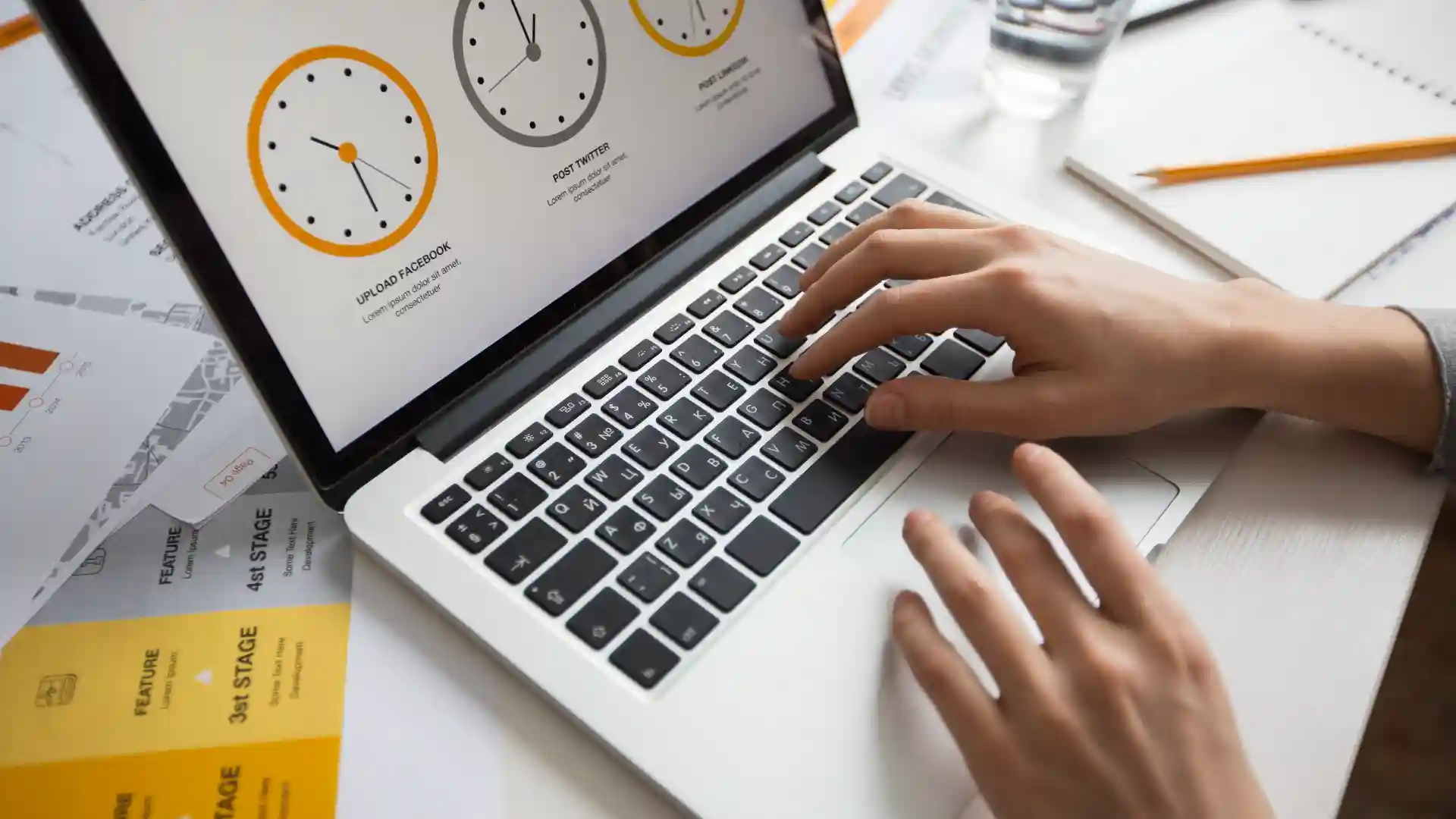 Employee using laptop for time tracking – digital workforce management and labor cost control